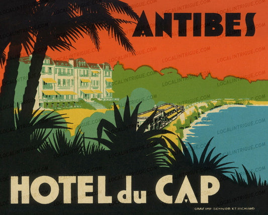 Vintage luggage decal for Hotel du Cap in Antibes with palm trees and coastal view.