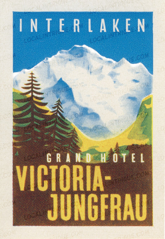 Vintage luggage decal of Interlaken with mountains and trees, featuring 'Grand Hotel Victoria-Jungfrau'.